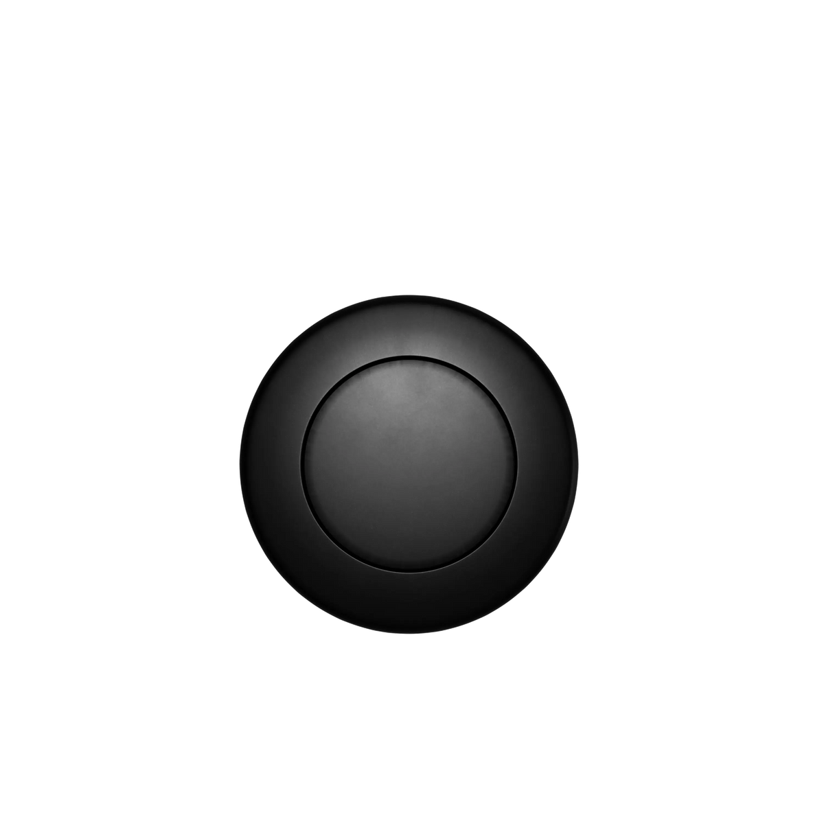 The Custom Drain Cap Finish is a sleek, black, circular device featuring a minimalist design set against a black background. It boasts a central button-like element encircled by a subtly raised outer ring.