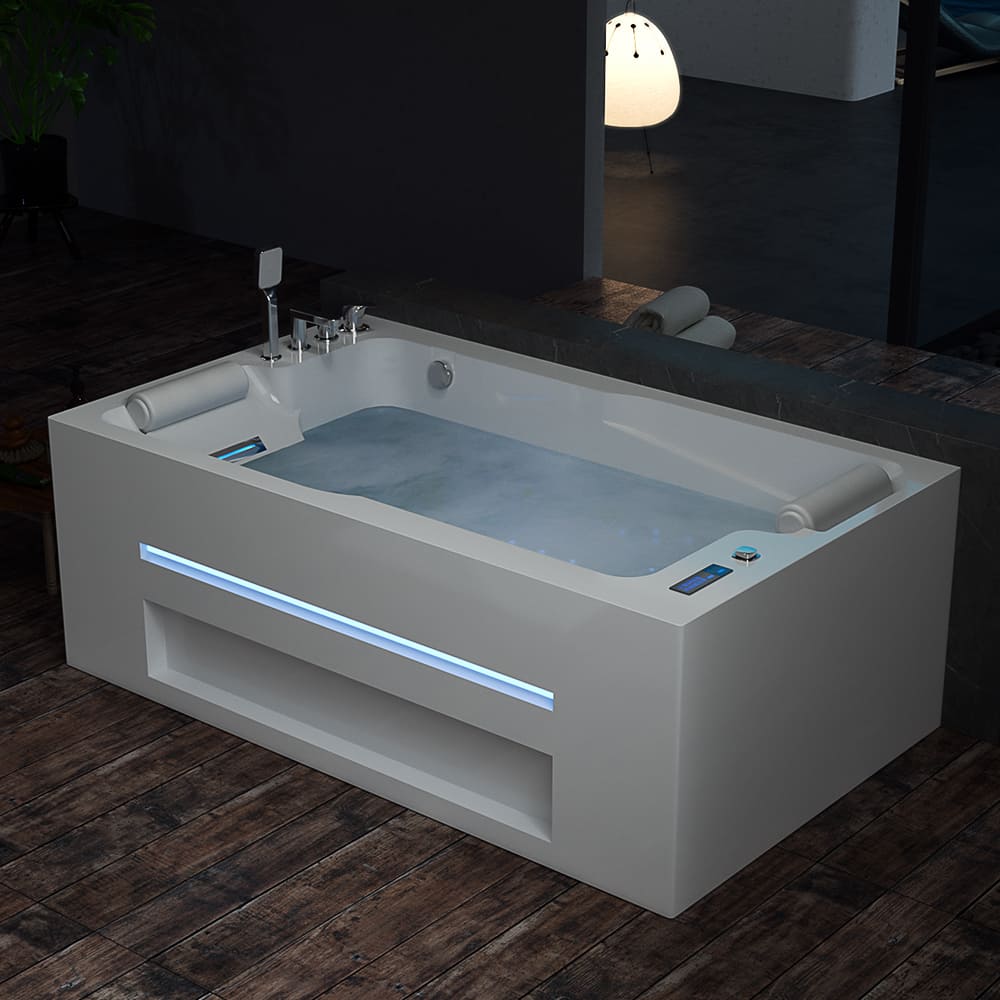 The sleek 71 in. Alcove Massage Thermostatic 2-Person LED Tub With Right Drain by Empava is a modern white rectangular bathtub filled with water, equipped with digital controls and headrests on both ends. It features an inline heater and a glowing horizontal light strip on its side, offering potential neck massage settings for cervical spondylosis relief. The tub is placed on a dark wooden floor in a dimly lit room, enhancing its contemporary design.