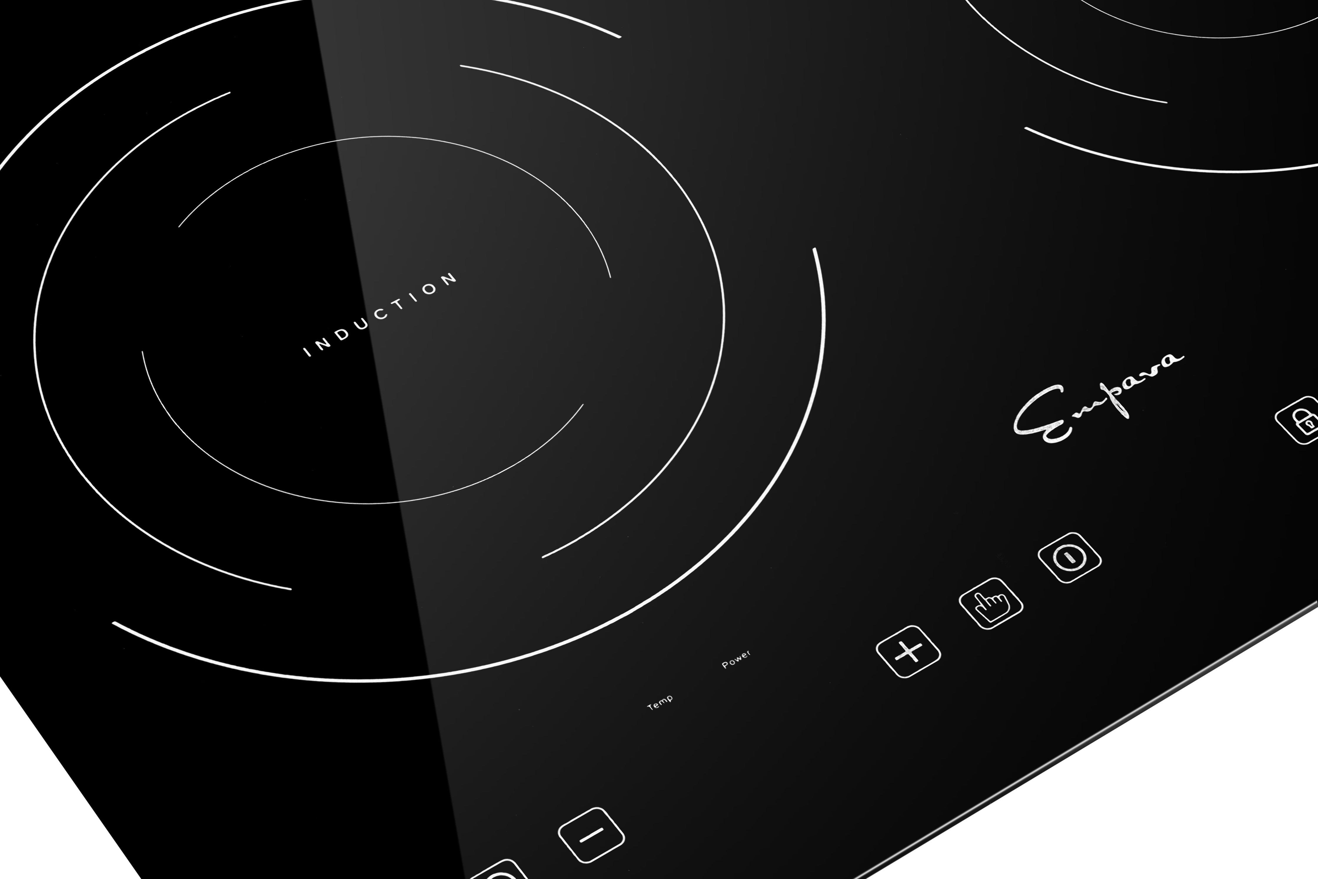 A close-up view of the sleek black Empava 12 In. Induction Cooktop with 2 burners, showcasing its touch controls. The cooktop features two circular cooking zones and a minimalistic design. Various icons for controlling power, temperature, and timer settings are visible on the bottom right.