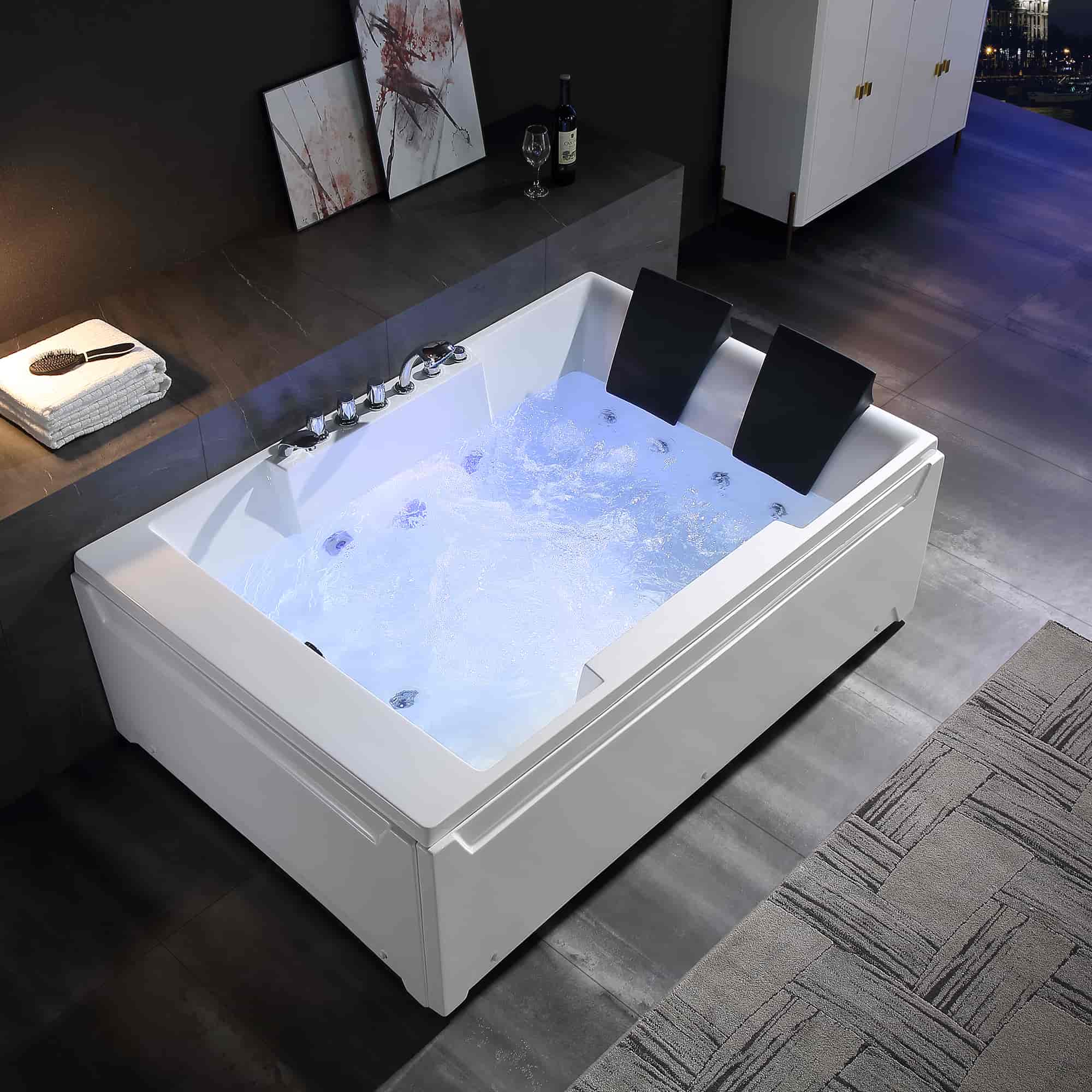 The 72" Alcove Whirlpool LED Bathtub for 2 Persons with Left Drain is a modern white rectangular tub featuring dual headrests and multiple faucet controls on the side. Designed for comfortable soaking and hydrotherapy, it boasts a clean, minimalistic style with smooth, sleek edges.