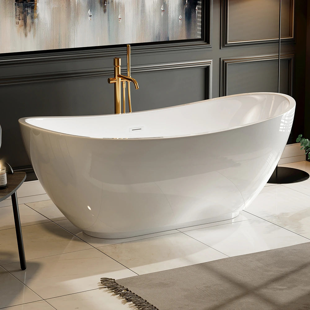 A modern bathroom features the 69" Freestanding Soaking Tub with Center Drain, showcasing an ergonomic design with a sleek, white finish and curved edges. The bathtub is complemented by a floor-mounted gold-toned faucet. The walls are painted in a dark color with decorative paneling, while the floor boasts light marble tiles.