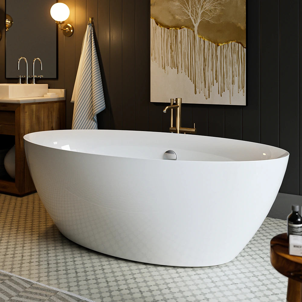 A modern bathroom featuring the 71" Freestanding Soaking Tub with Center Drain, made from ergonomic acrylic material, placed on a patterned floor. The room boasts dark paneled walls, a wooden vanity with dual sinks, a towel hanging on the wall, a round wall light illuminating the space, and an abstract tree painting adding artistic flair.