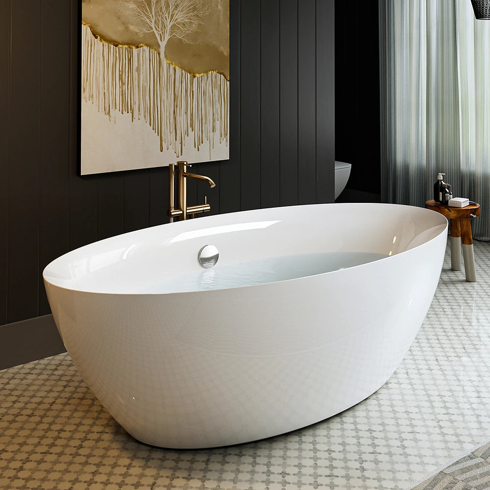 A modern bathroom featuring the 71" Freestanding Soaking Tub with Center Drain, showcasing an ergonomic and sleek white oval design, partially filled with water. A contemporary faucet is mounted on the black wall behind the tub. To the right is a small wooden stool and a large window with sheer curtains. A large abstract painting adorns the wall.