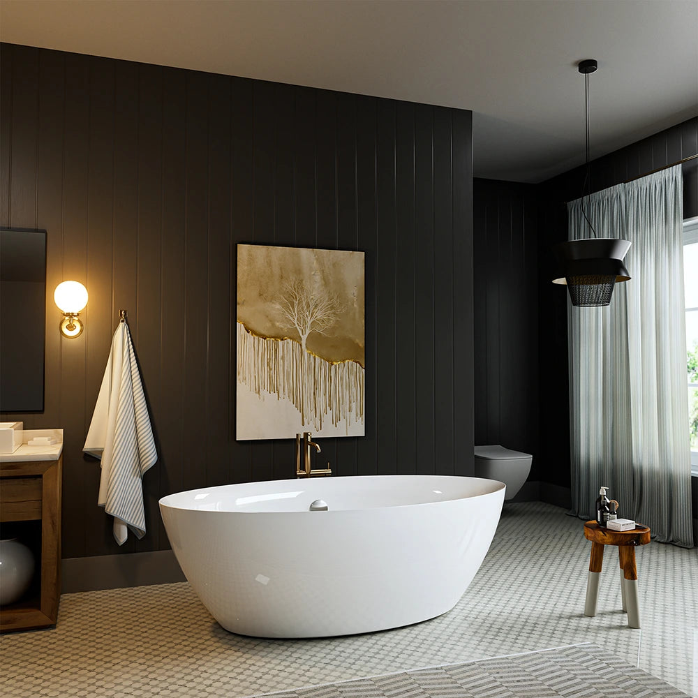 A modern bathroom showcases a 71" Freestanding Soaking Tub with Center Drain, featuring an ergonomic design and a sleek white finish, complemented by a bronze faucet. The dark paneled walls are adorned with a minimalist painting. Natural light streams in through a window with sheer curtains. A small wooden stool and a hanging light fixture complete the decor.