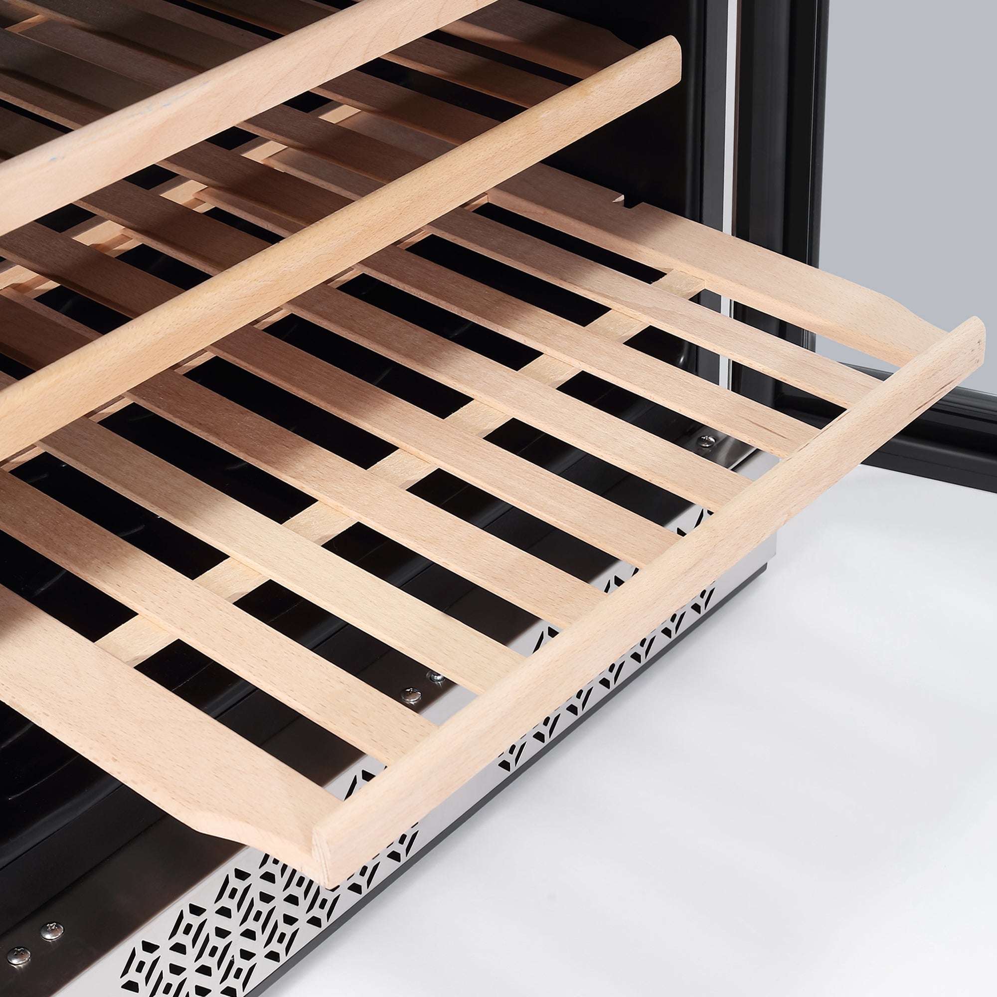 Close-up of a partially open wooden shelf in an Empava 24 Inch Fridge Dual Zone Wine & Beverage Cooler. The shelf, made of light-colored wood slats, extends from the cooler which features black trim and a vented metallic panel at the bottom.