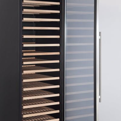 The Empava Wine Cooler 70" Tall Wine Fridge is displayed with a sleek, modern design featuring a glass front door and wooden shelves. The left section contains movable racks with multiple horizontal layers, while the right section incorporates the door equipped with a vertical handle. Its spacious interior appears empty and ready for storage.