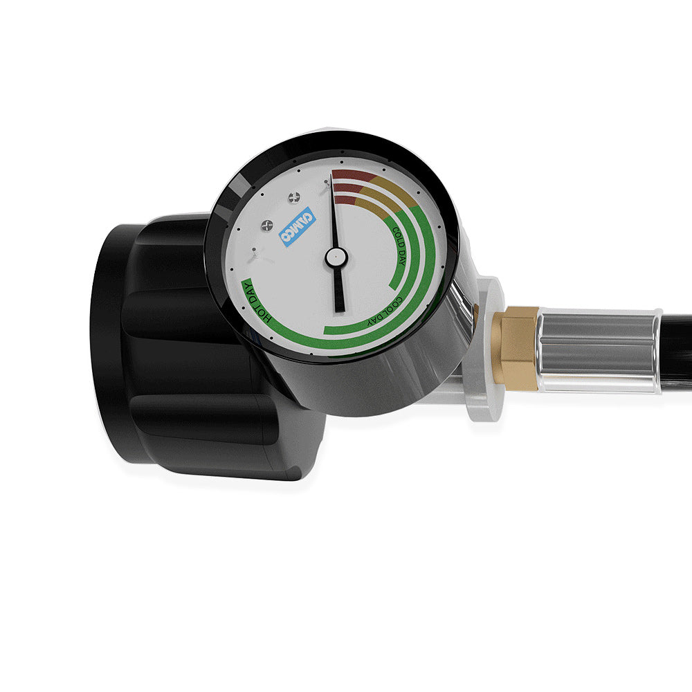 This image shows a close-up of the pressure gauge on the Empava 5 Feet Propane Adapter Hose 1 lb to 20 lb with Upgraded Gauge EMPV-50EH47. The gauge features a round dial with color-coded green, yellow, and red sections indicating different pressure levels. The device housing is predominantly black and includes metallic connectors.