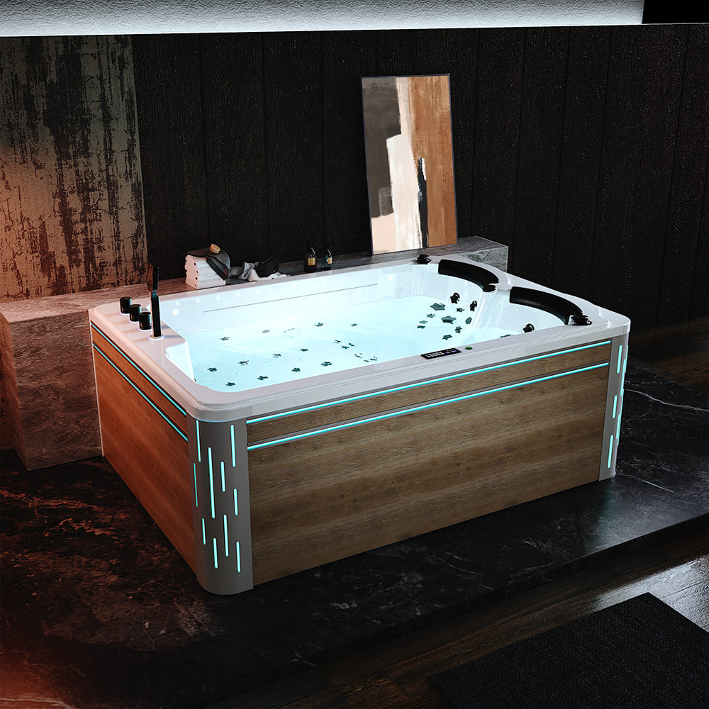 The Empava 75 in. Freestanding Luxury Thermostatic 2-Person Rectangle LED Tub with Right Drain features a modern, illuminated jacuzzi experience with sleek wooden paneling and accent LED lights along the sides. The water remains clean and clear, thanks to visible jets and an efficient changeable filter system. The surrounding decor includes dark stone tiles, a mirror, and toiletries neatly arranged on the ledge.