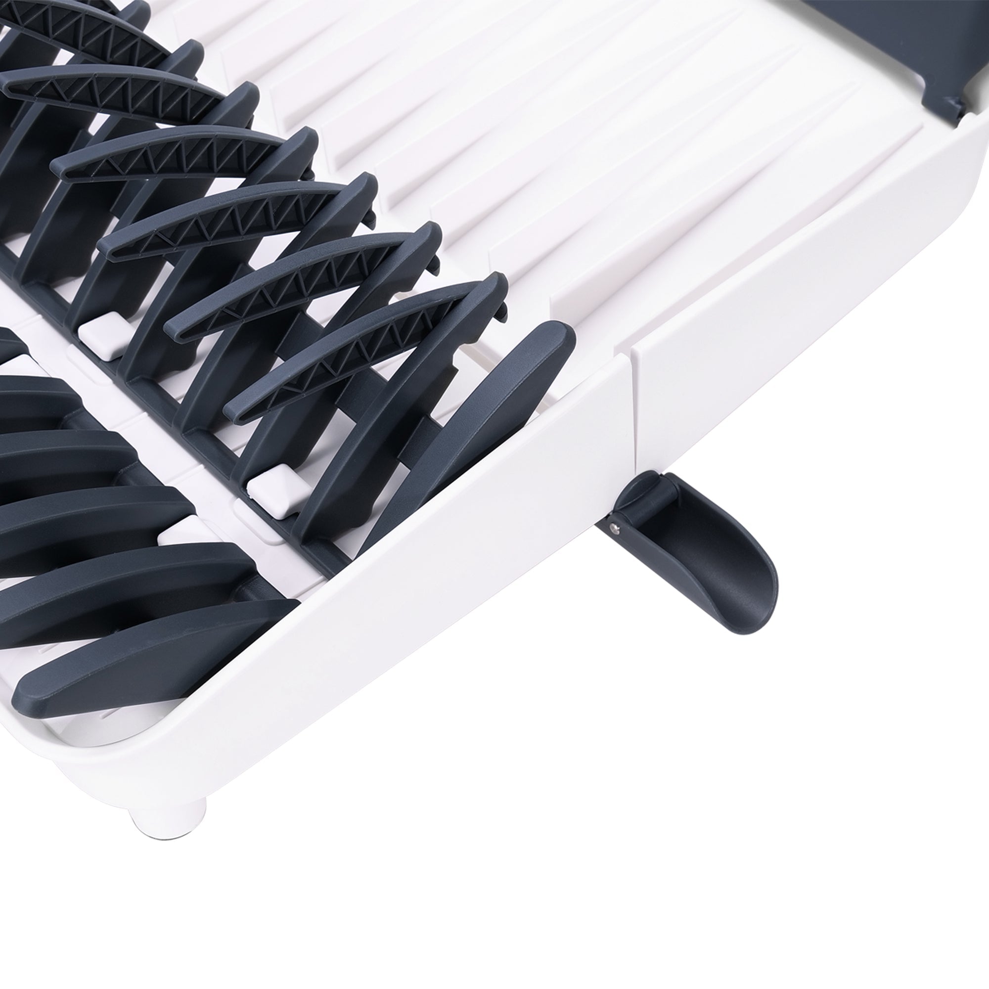 A close-up view of the Empava Folding Dish Rack With Drainboard Set EMPV-GIFT10, featuring vertical slots for holding plates. The white and black rack includes an adjustable mechanism on the side with a black lever, allowing for different angles or positions.