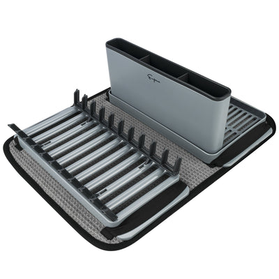 The Empava PP Drying Drainers Dish Rack EMPV-GIFT09 is a gray, multi-slot expandable dish rack that comes with a black mat underneath. It features slots for plates and utensils, along with a separate divided utensil holder, both constructed from gray plastic. The mat has a textured surface with black edges.
