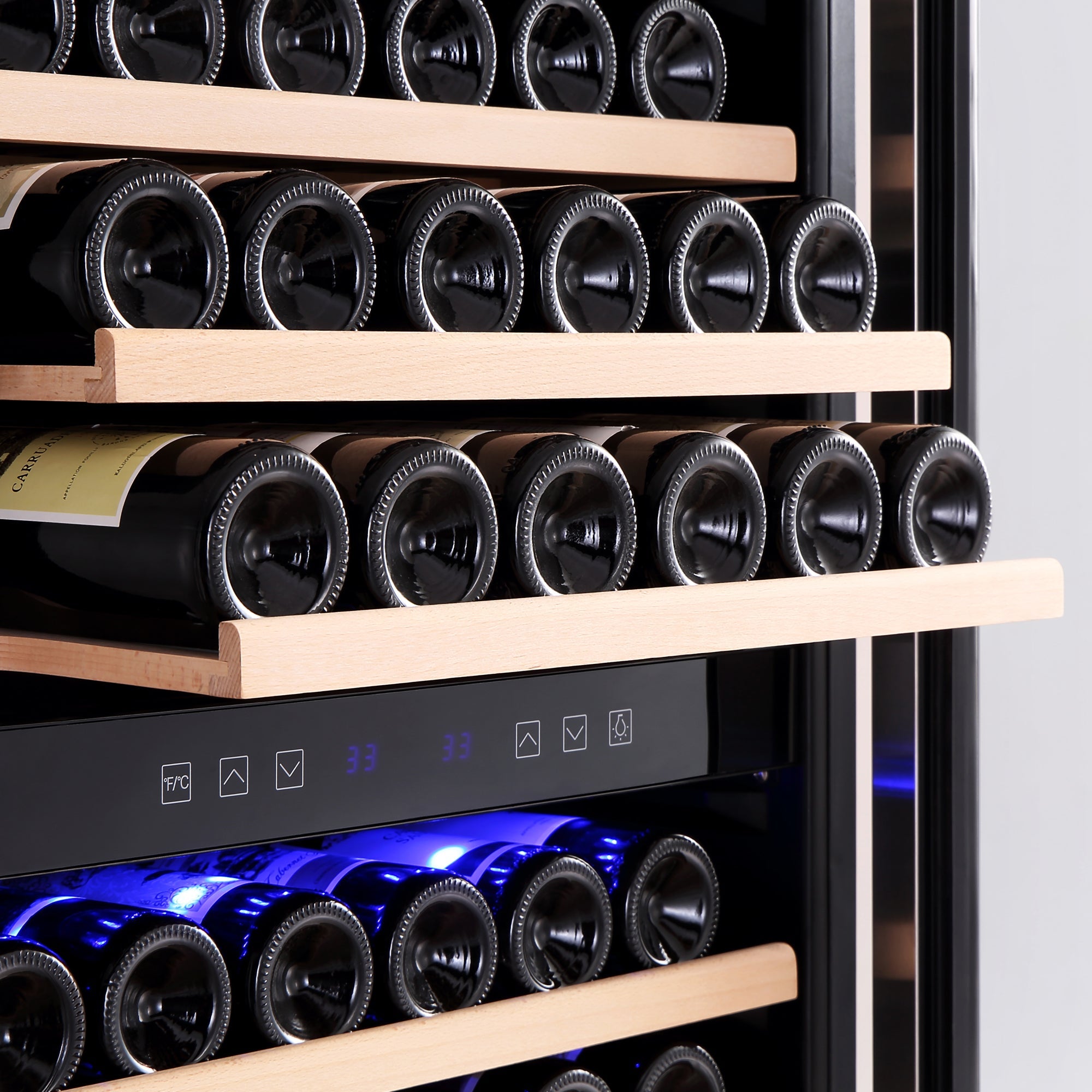 A close-up view of the Empava Dual Zone Wine Cooler 70" Tall Wine Fridge filled with multiple rows of wine bottles. The shelving features light wooden slats, and the fridge's digital control panel displays temperature settings illuminated by blue lights, ensuring optimal temperature distribution for your collection.