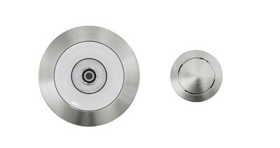Two Custom Nozzle Color shower drains are displayed on a white background. The drain on the left is larger and circular with a white center, featuring a central hole. The smaller drain on the right is also circular with a brushed metal finish and a central hole.