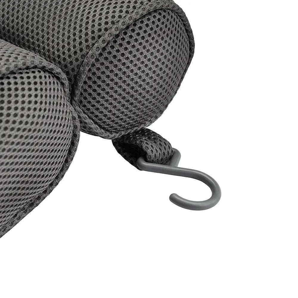 Close-up of the gray, mesh-covered Soft Bathtub Pillow For Whirlpool Spa Tubs. The pillow features a plastic hook for convenient hanging or securing to luggage. The breathable mesh material is designed for ultimate comfort.